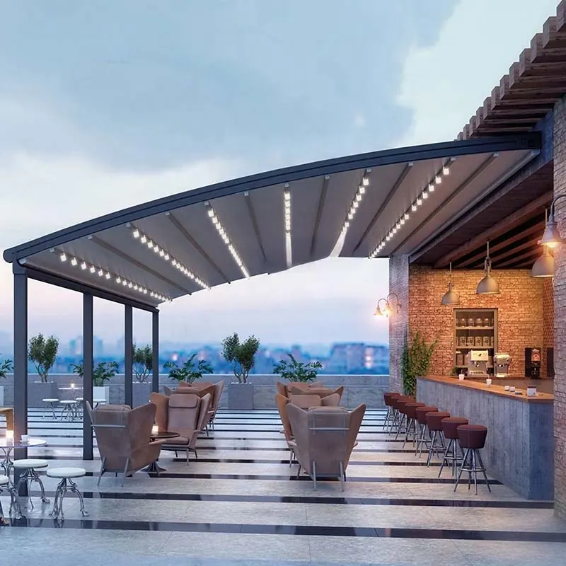 Arched canopy with built-in LED lights over a bar terrace at dusk