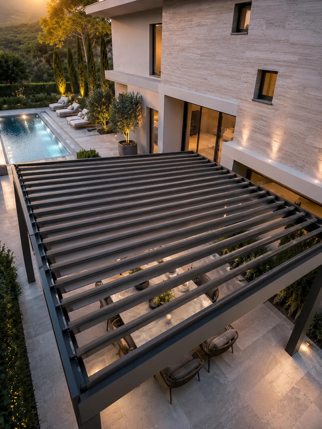 Aerial view of a louvred pergola over a restaurant-style terrace beside a swimming pool