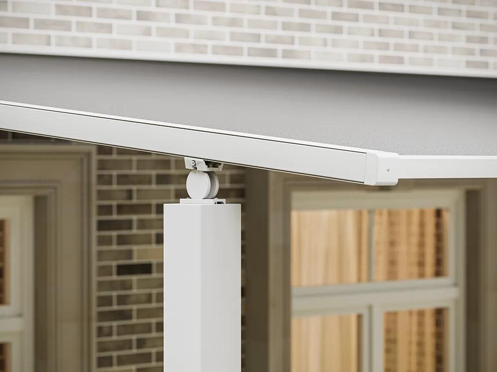 Close-up of a pergola beam with a zip screen housing fixed beneath it