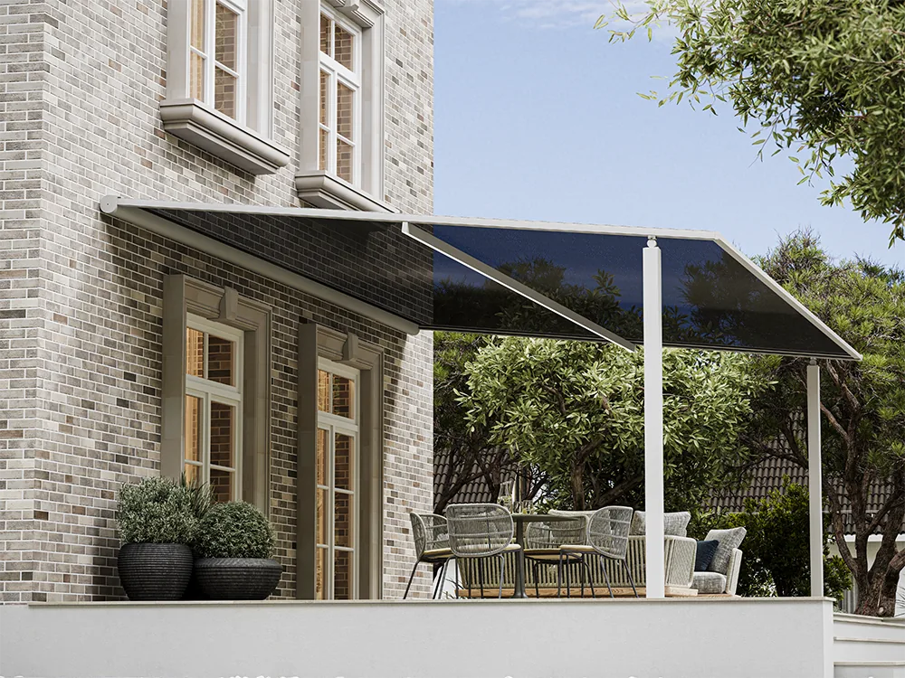 House front with pillar-supported pergola and zip screens lowered between the columns