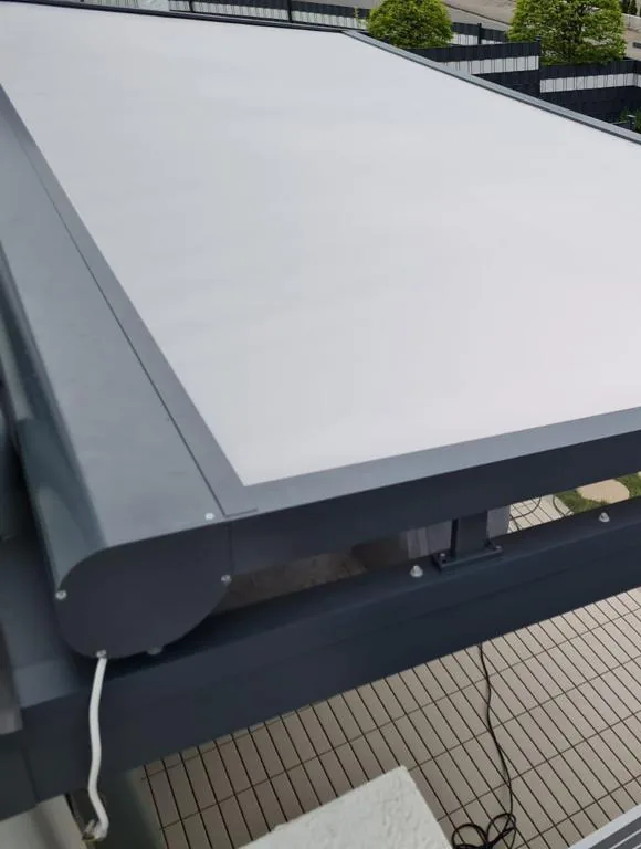 Winter garden glass roof with zip screen seen from the side