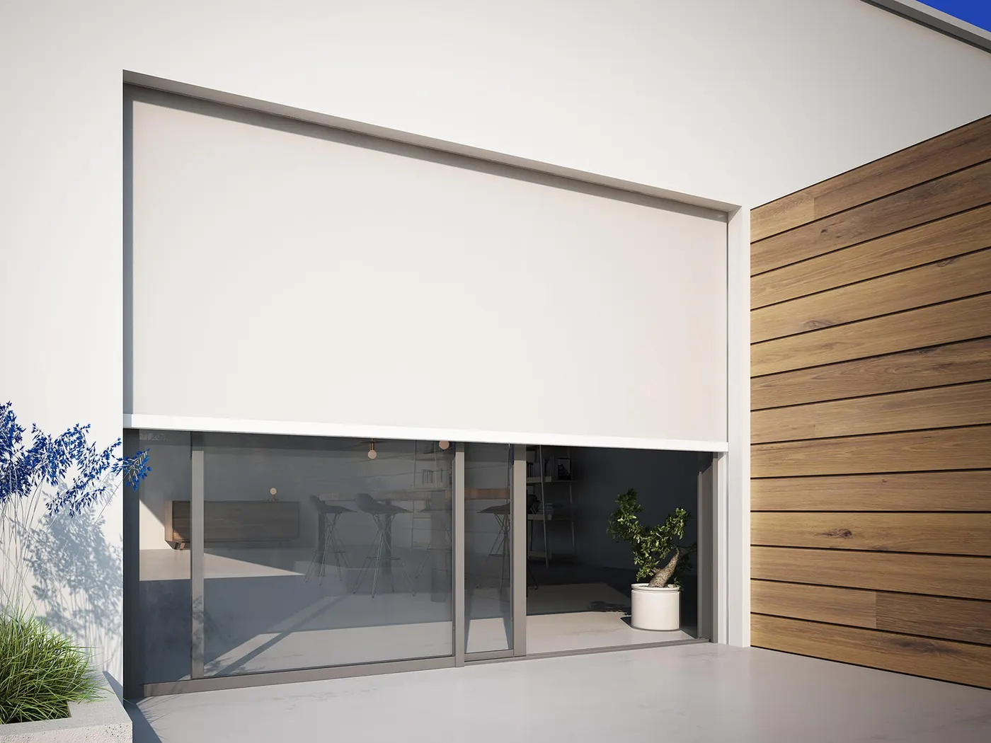 Large vertical zip screen above a sliding glass door on a modern white facade
